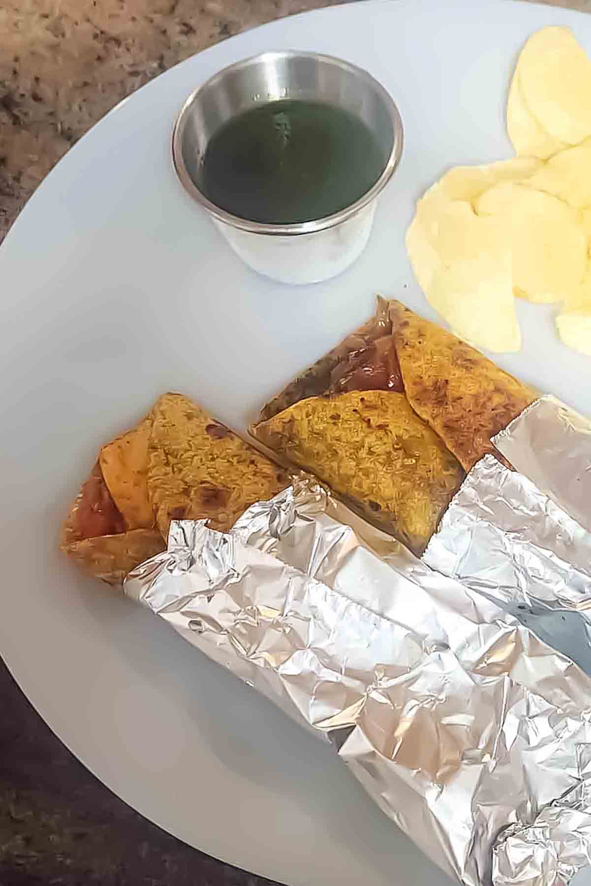 This easy Paneer Kathi Roll recipe is a delicious Indian street food favorite made with paneer, sautéed onions, colorful bell peppers, and aromatic Indian spices, all wrapped in soft roti or thepla.