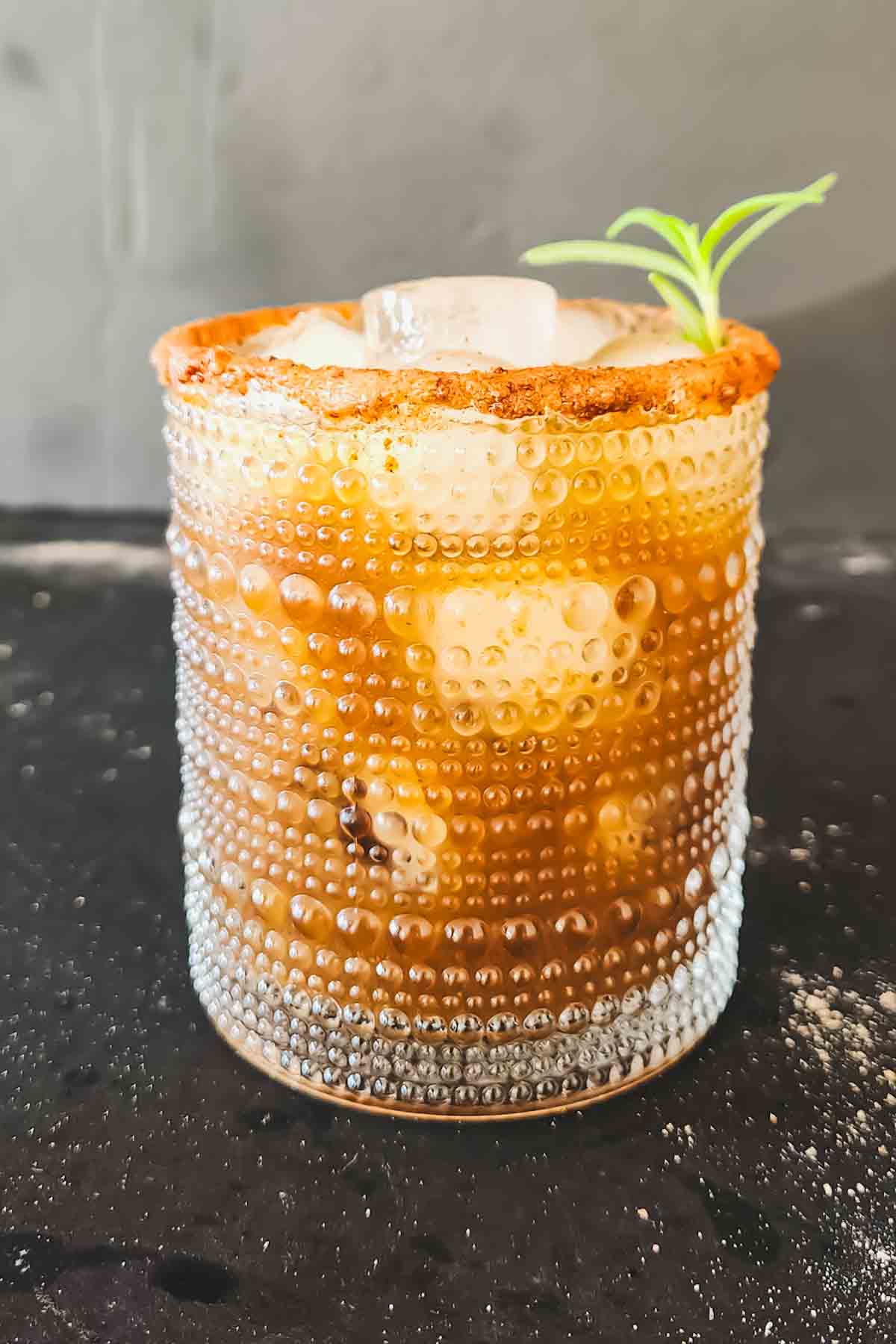 Easy tamarind mocktail with ginger ale, agave, Indian chaat masala, and a tangy chamoy rim. This refreshing Indian-Mexican fusion drink is ready in 5 minutes!