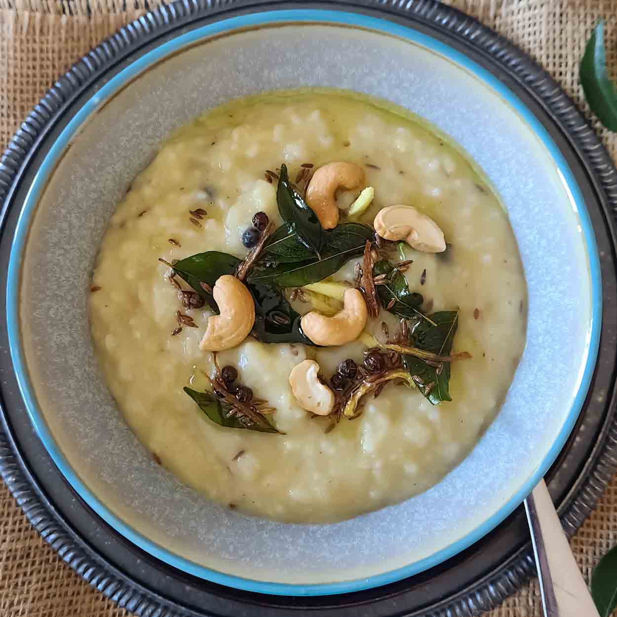 Ven Pongal is a traditional South Indian savory rice and moong dal dish seasoned with black pepper, cumin, ginger, curry leaves, and ghee. This easy Instant Pot Ven Pongal recipe makes a creamy, comforting vegetarian breakfast with simple pantry ingredients.