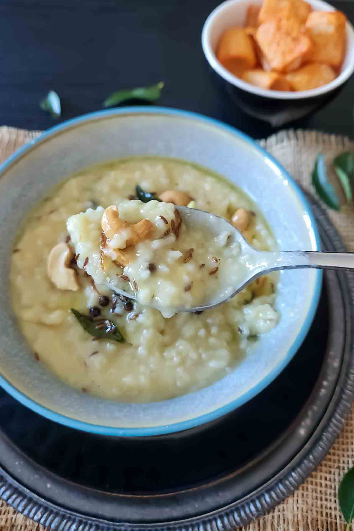 Instant Pot Ven Pongal made with yellow moong dal and rice served for South Indian Breakfast.